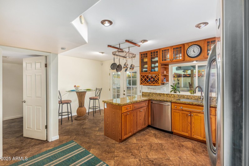 Kitchen with island and breakfast nook.