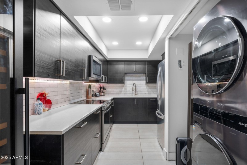 Kitchen w/ Stacked Laundry