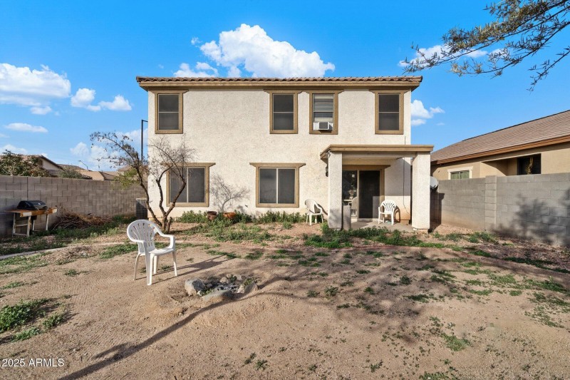 LARGE CORNER LOT BACK YARD