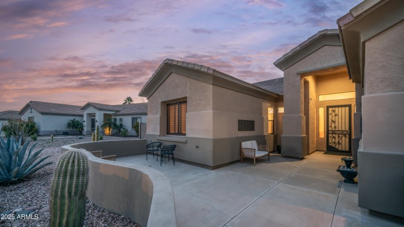 Front porch sitting area at sunset