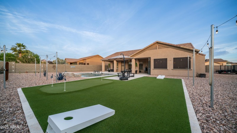 Synthetic grass area in back yard