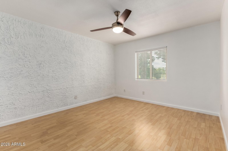 Bedroom with Walk-In Closet and Bathroom