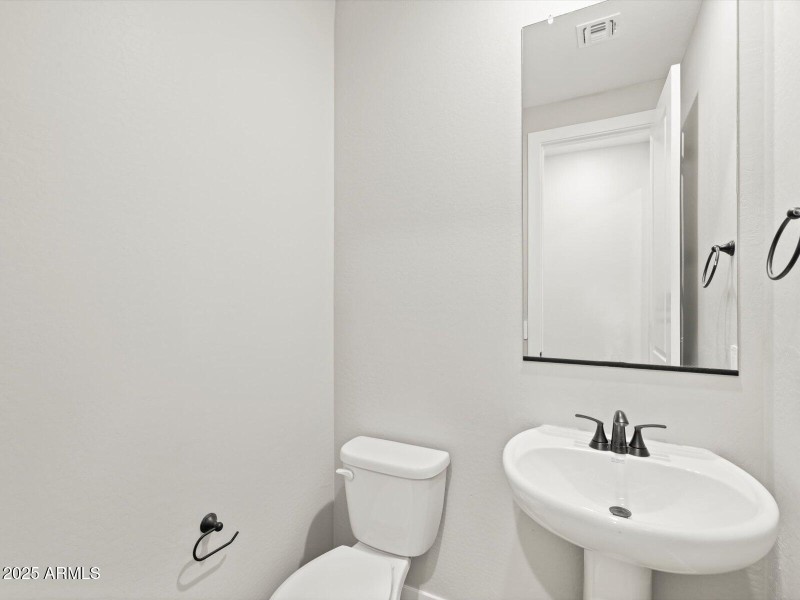 Photo is not of the actual home.