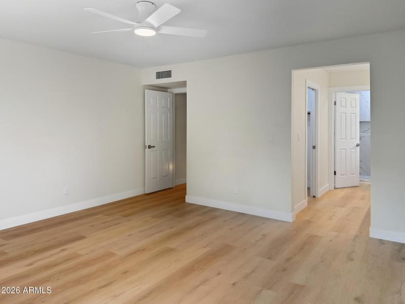 Primary bedroom and attached bath