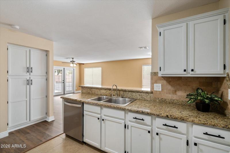 Kitchen to Great Room + Pantry