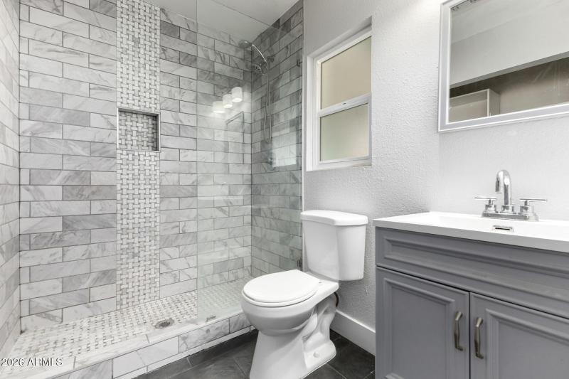 Primary Bathroom with Walk-In Closet
