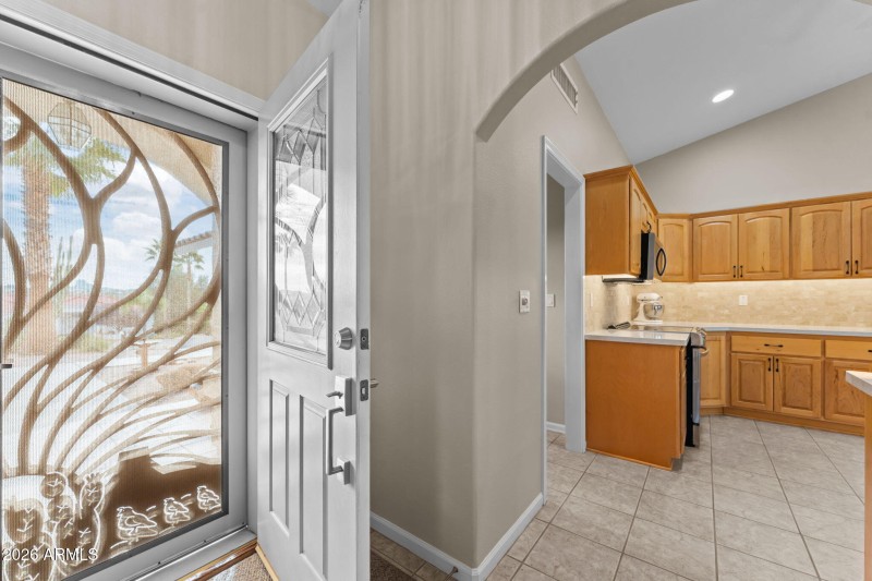 Entry to Great room and left to Kitchen