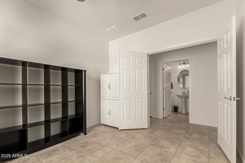 Den with double doors for privacy