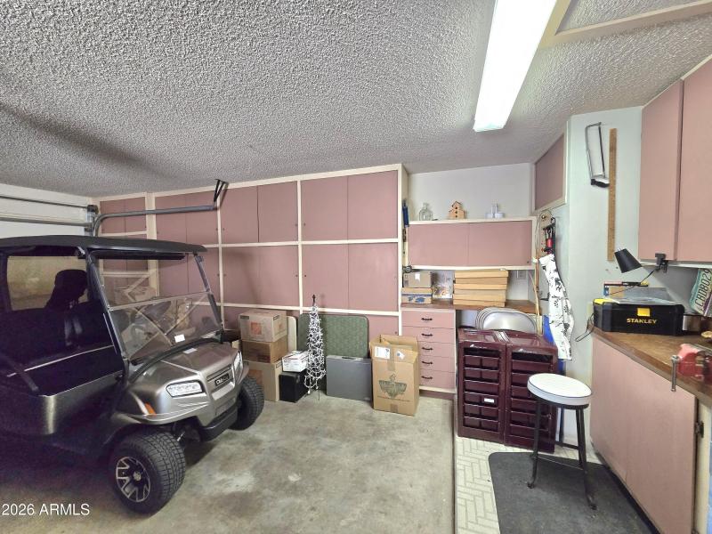 Garage with Cabinets and Work Bench