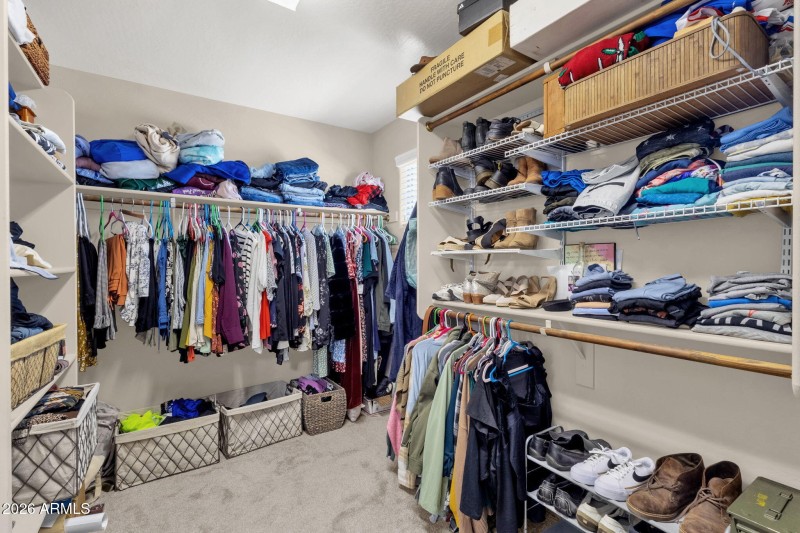 Large primary suite walk-in closet