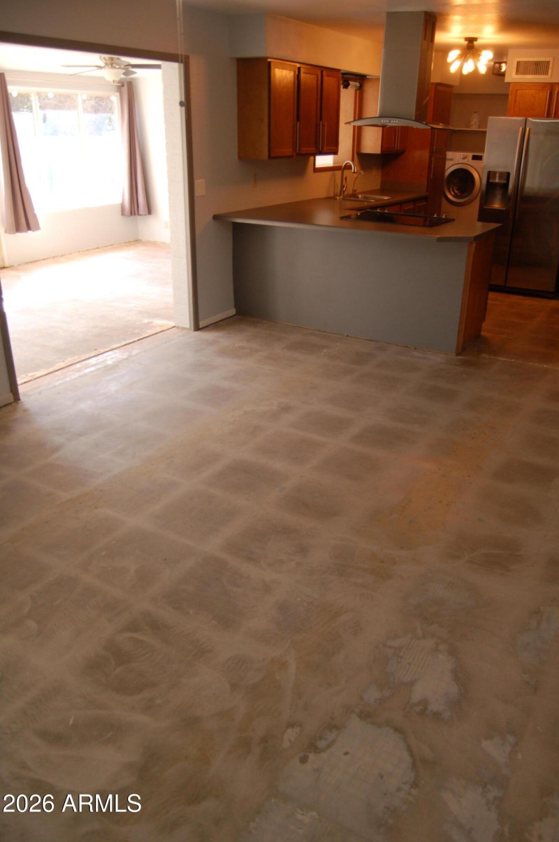 view to kitchen and den