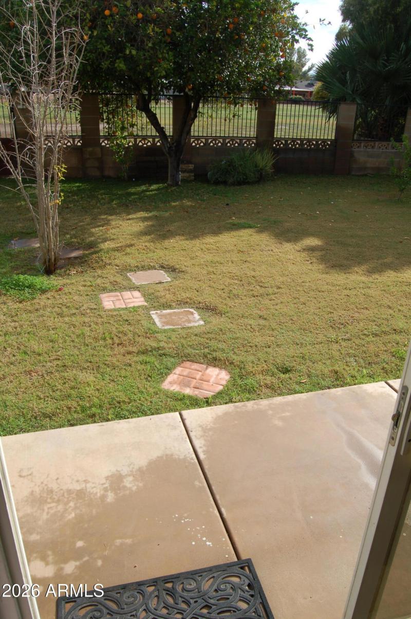 Backyard and fence to golf Course