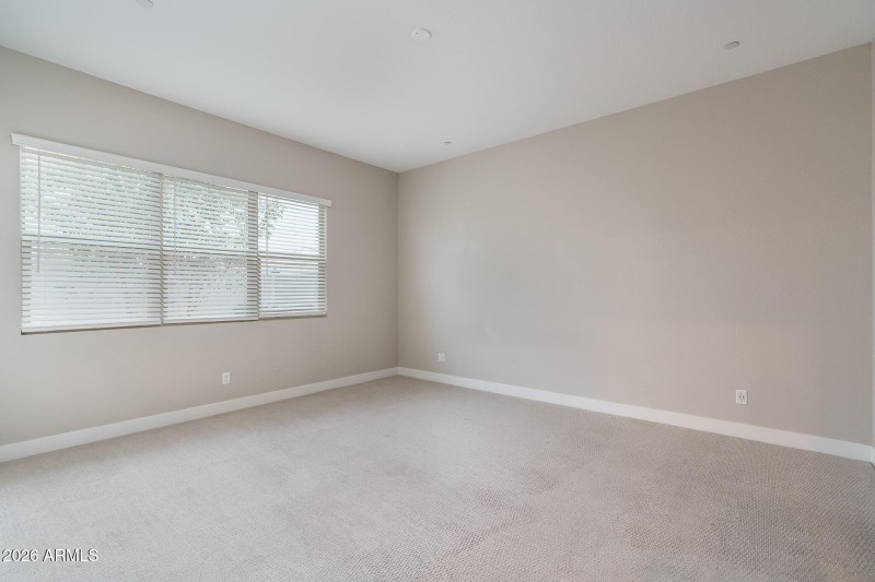 12) PRIMARY BEDROOM DOWN