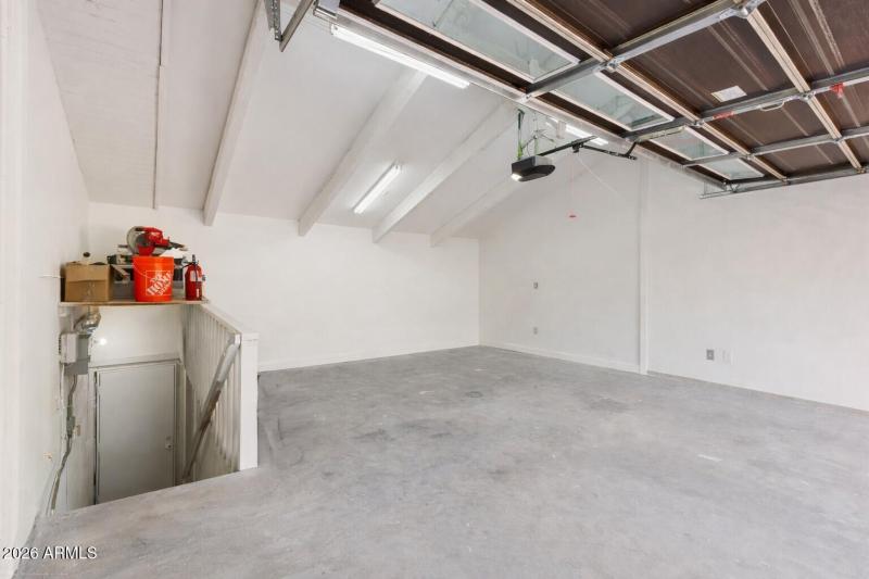 2 Car garage with stairwell too.