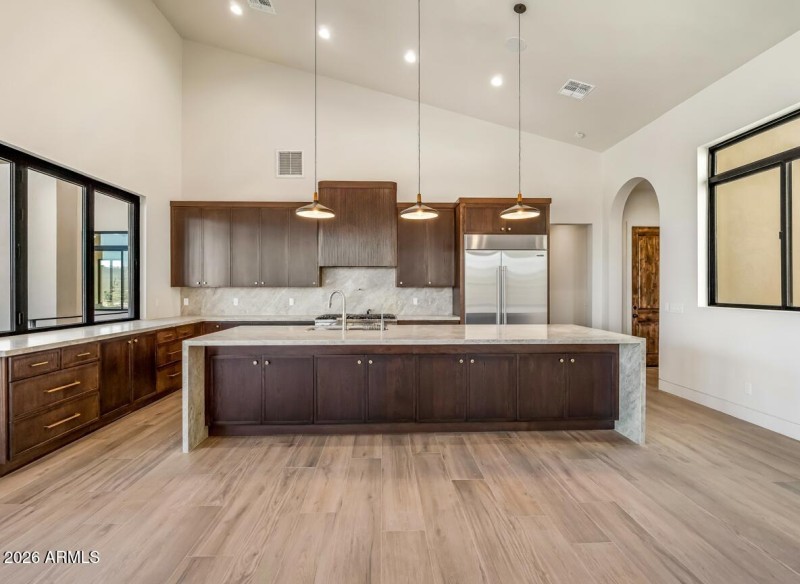 Kitchen with large quartzite island