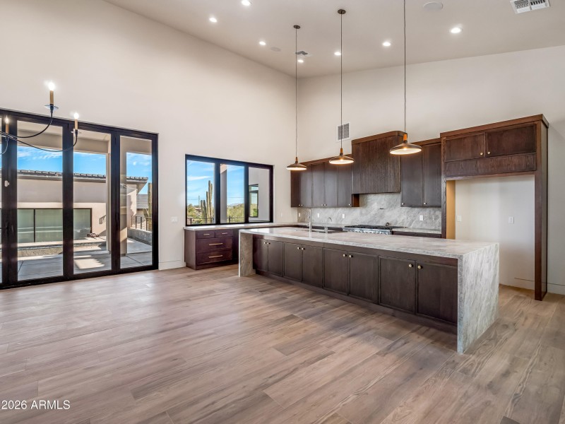 Kitchen with large quartzite island