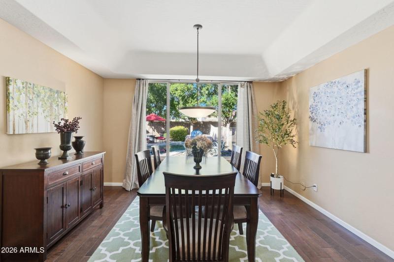 Formal dining with views of pool