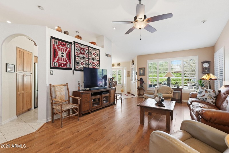 Wood laminate flooring in living room.