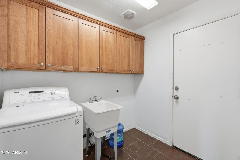 INSIDE LAUNDRY WITH A UTILITY SINK!!