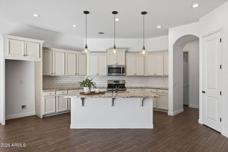 Cream cabinets are from builder