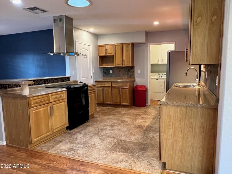 Kitchen toward Stove