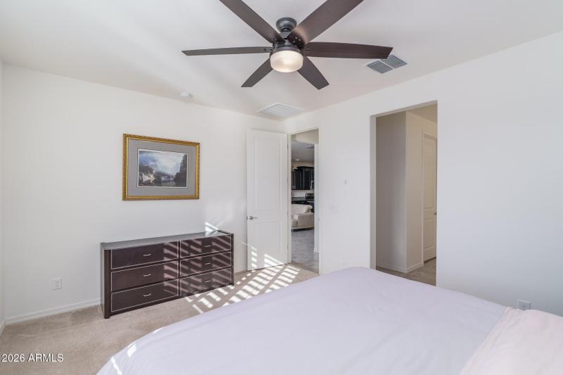 11) PRIMARY BEDROOM