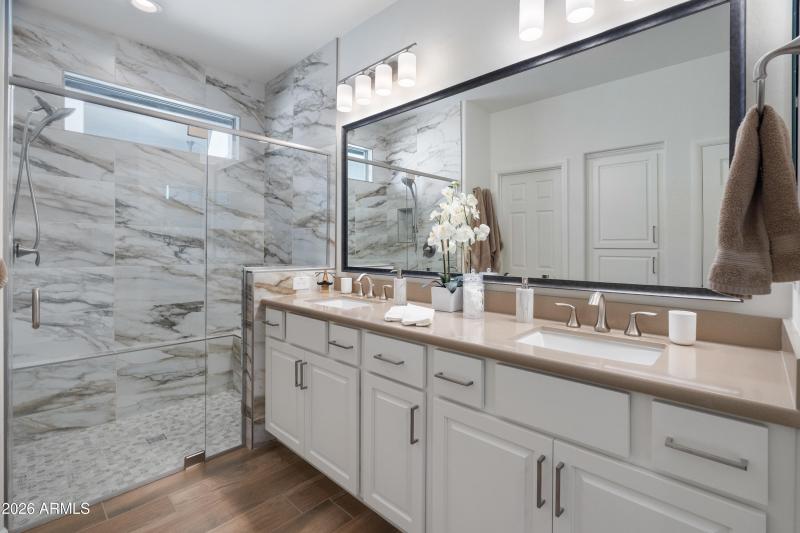 primary bath dual vanity and shower