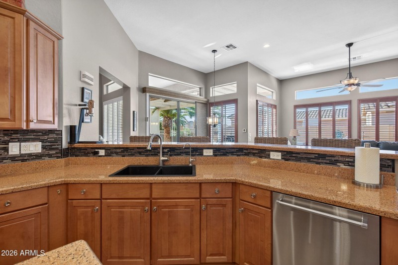 Views from Kitchen to Backyard Oasis