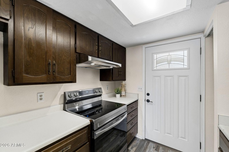 Kitchen with new door and stove