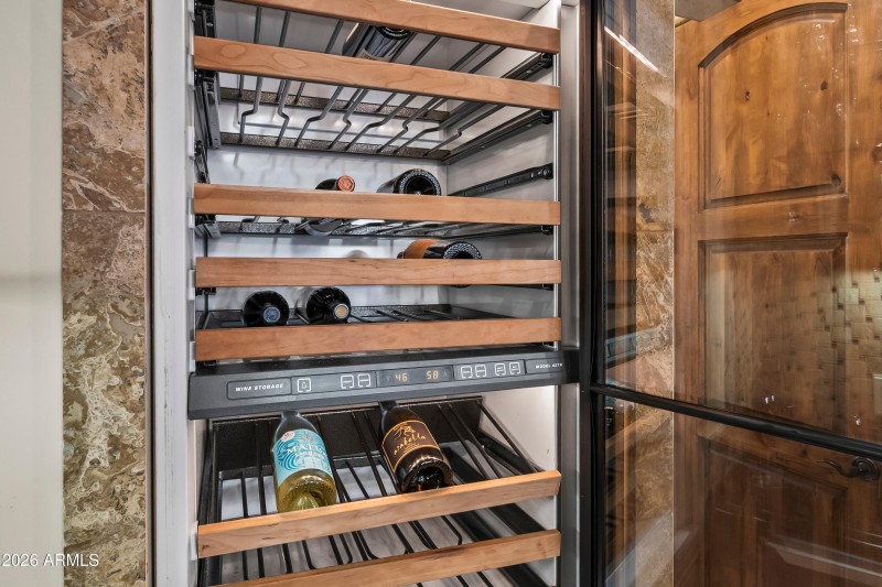 Sub-Zero wine cooler in wet bar