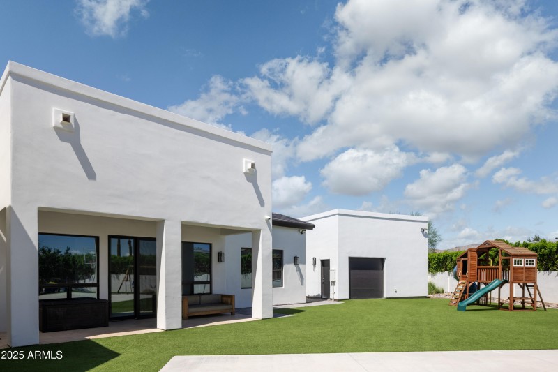 BACK OF HOME & DETACHED 2 CAR GARAGE