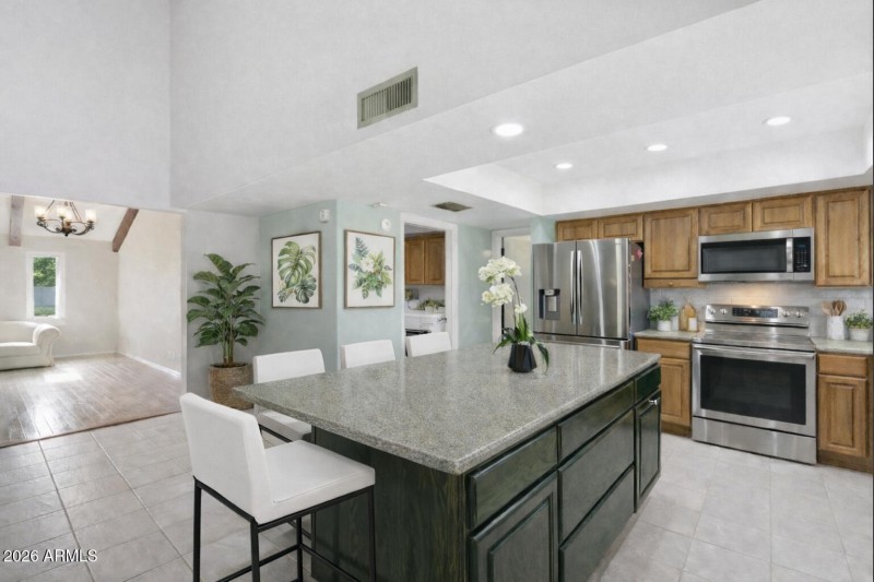 Coleen 16 W Wood Counter with plants and