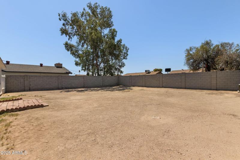 BLOCKED FENCED BACKYARD