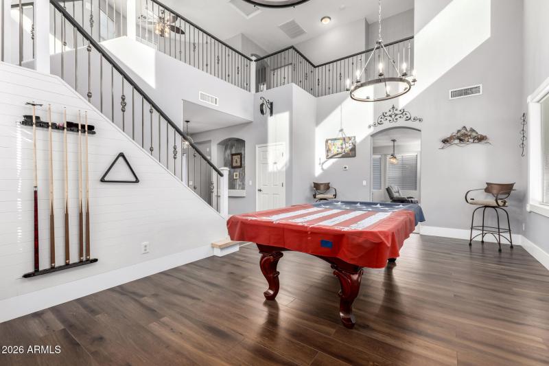 Great room showing grad staircase