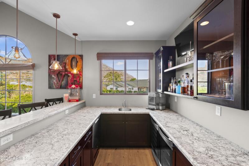 Lots of cabinets and views in bar