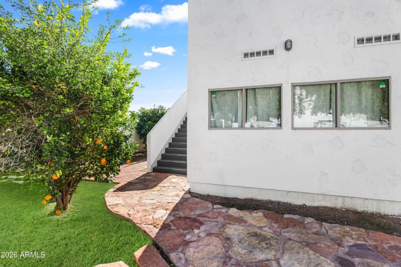 Backyard + Stairs to Rooftop Deck