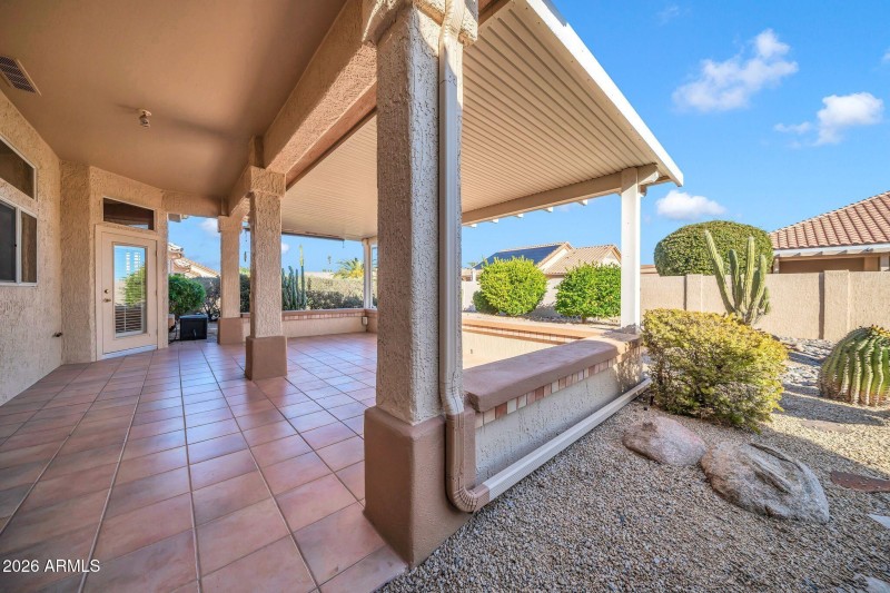 EXPANDED PATIO WITH A KNEE WALL