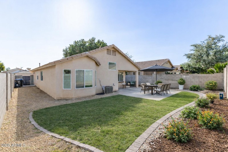Backyard oasis with vibrant landscaping