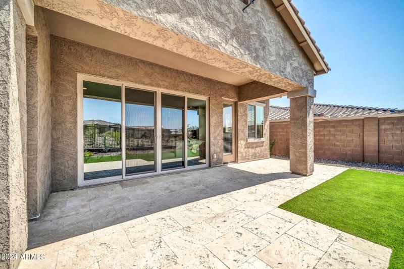 Large stone tiled patio