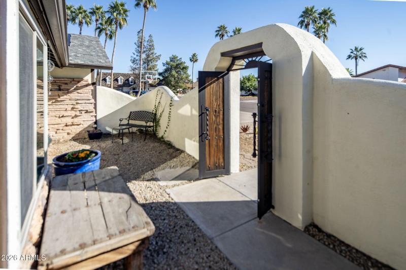 Custom entry gates to courtyard