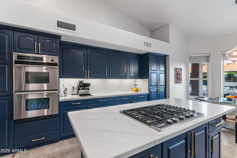 Quartz counters with ample cabinetry