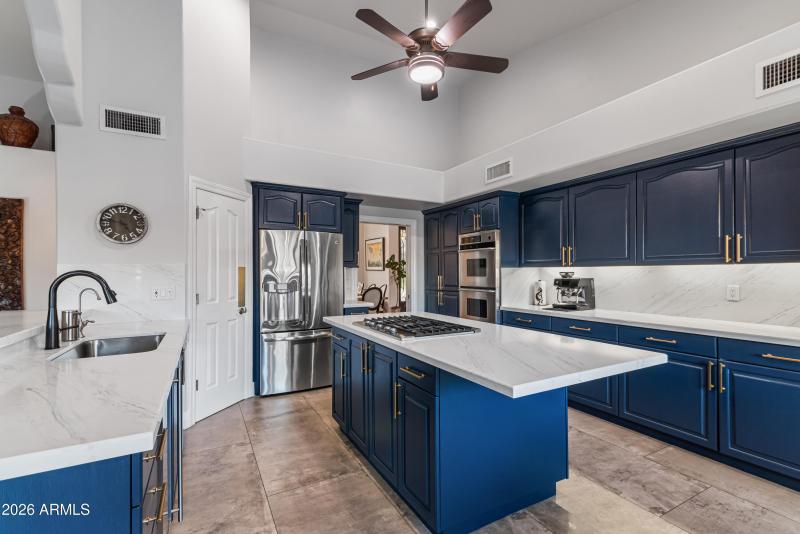 Distinctive cabinets with gold hardware