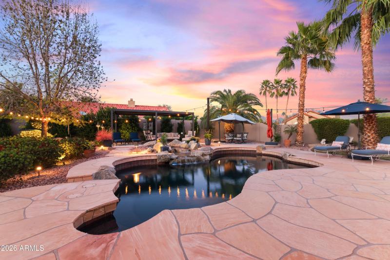 Pool showing off technicolor evenngsky