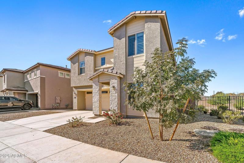 Front Exterior + Side Yard