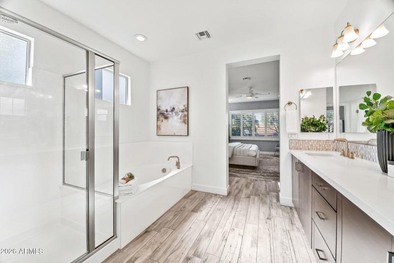 Primary Bathroom (Tub + Shower View)