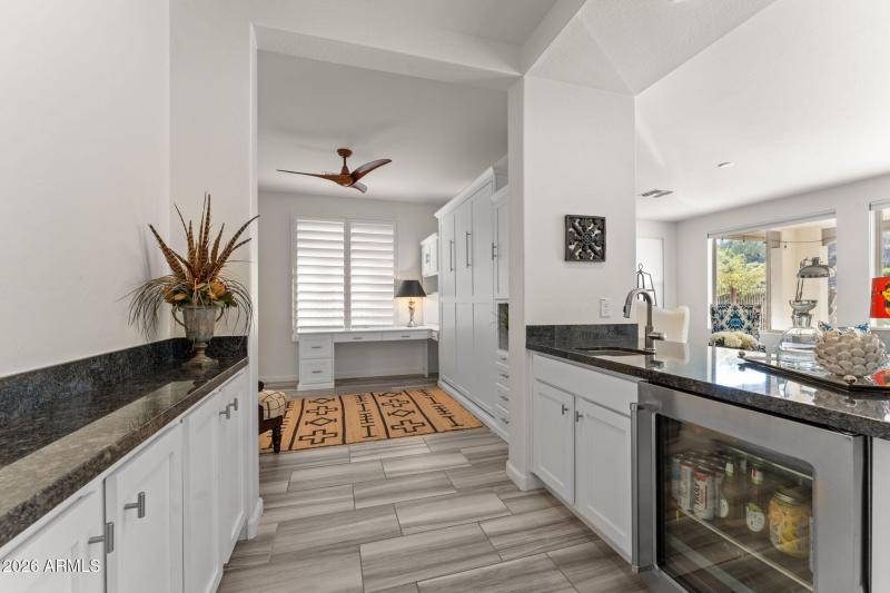 Wet bar leading to den