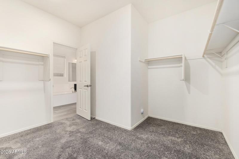 Primary Closet connects to Laundry Room