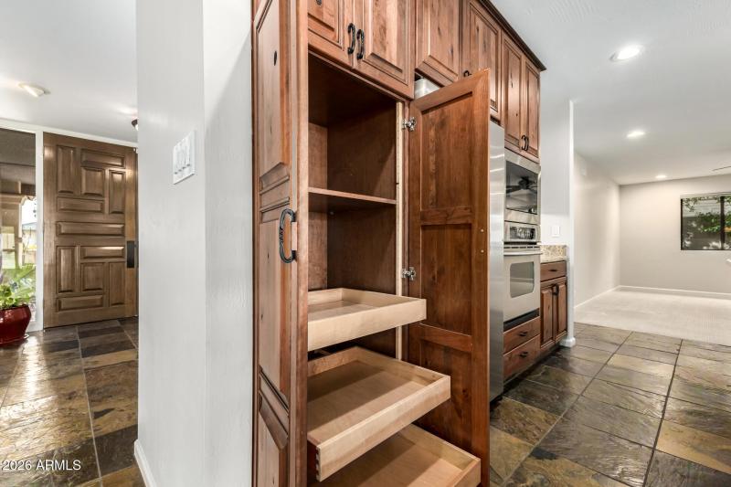 Pull out cabinets throughout kitchen
