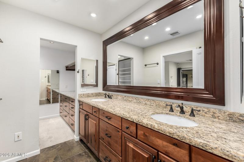 Double sinks and knotty alder cabinets
