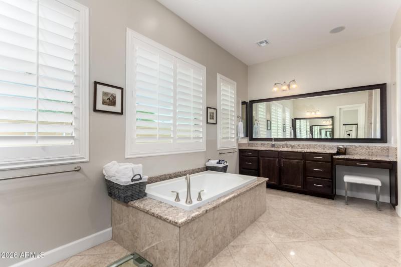 split vanities and sitting makeup area